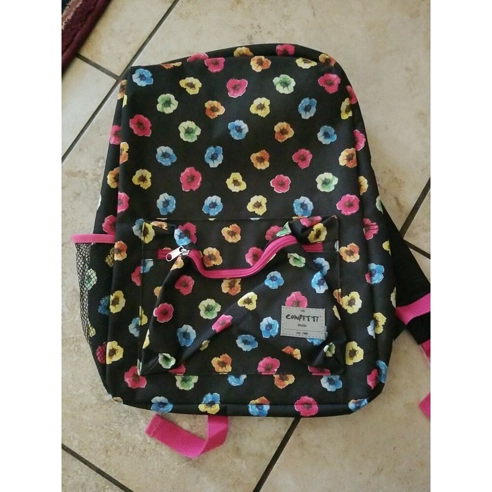 The Confetti Brand School Travel Weekend BackPack  Multi Color Flowers Pattern.